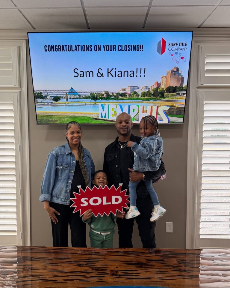 Memphis family celebrating closing day at Sure Title