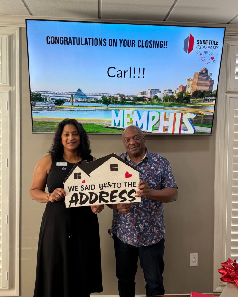 Homebuyers celebrating closing day with Sure Title