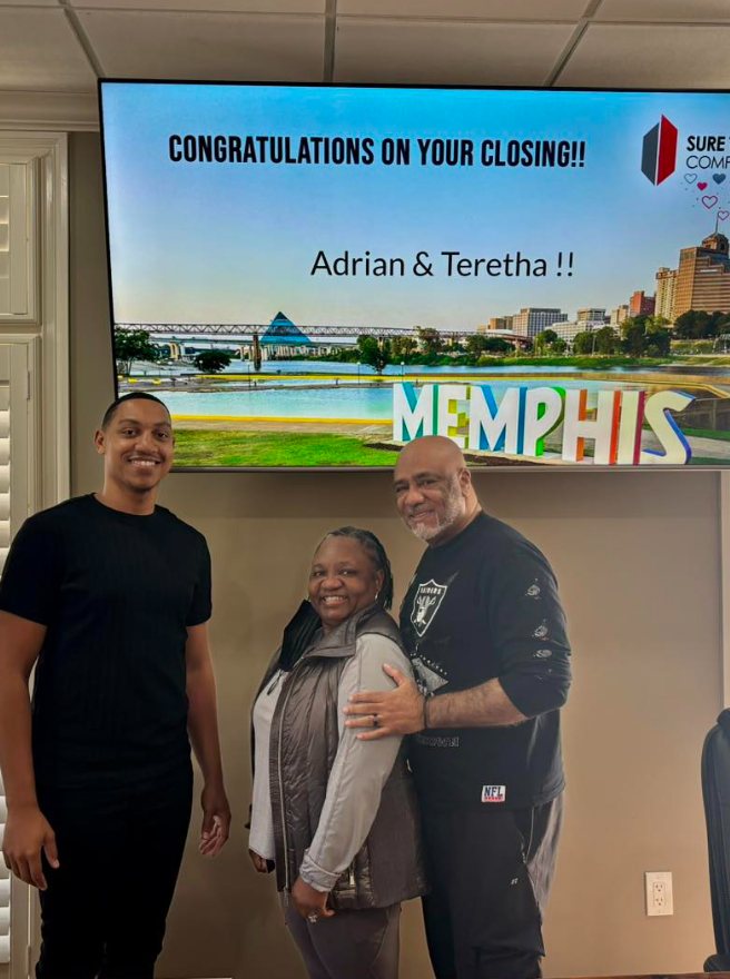Happy clients and Realtors celebrating closing day at Sure Title Company, Memphis